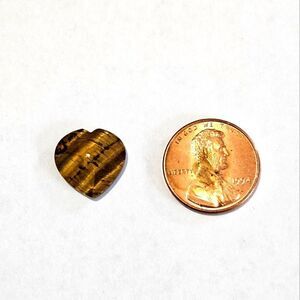 Tiger Eye, cut and faceted into a ❤️ shape. Great for wire wrapping.